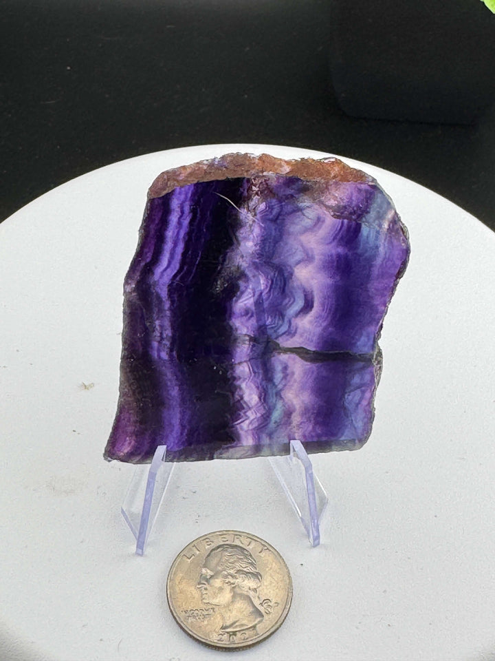 Beautiful mix of Rainbow Fluorite slabs from China. Wonderful mix of purples, blues, teals, and other colors in between! Some pieces have natural crack line formations. Some slabs have a varying thickness, as specified below. A) 4in x 2.5in x 9mm B) 3.25i