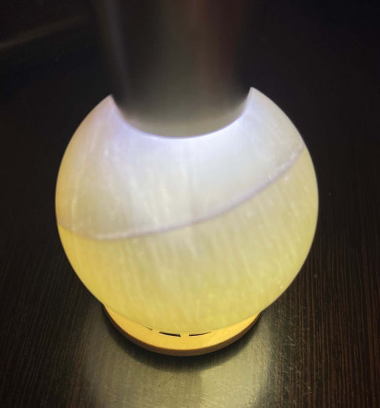 Beautiful Yellow Fluorite crystal sphere with purple banding, measuring 1.78-1.85 in / 45-47mm. Each Sphere is approximately 155-173g in weight. Stand Not Included