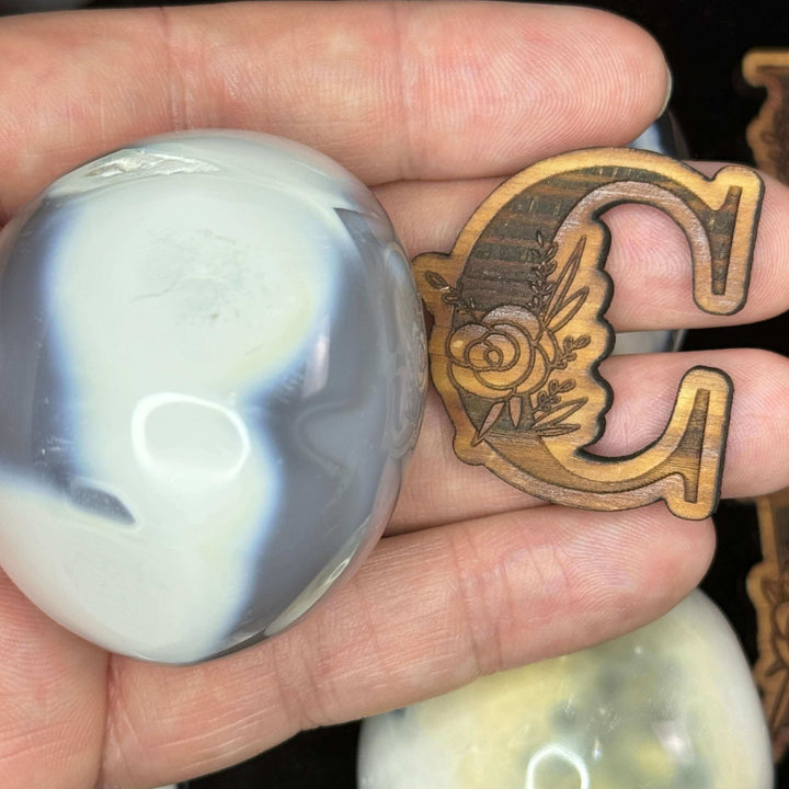 Polished Orca Agate Palm Stone