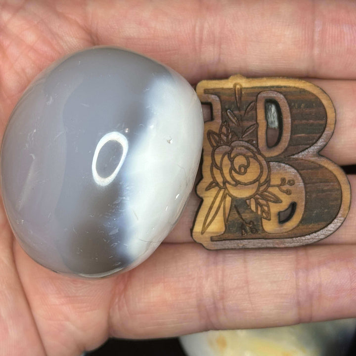 Polished Orca Agate Palm Stone