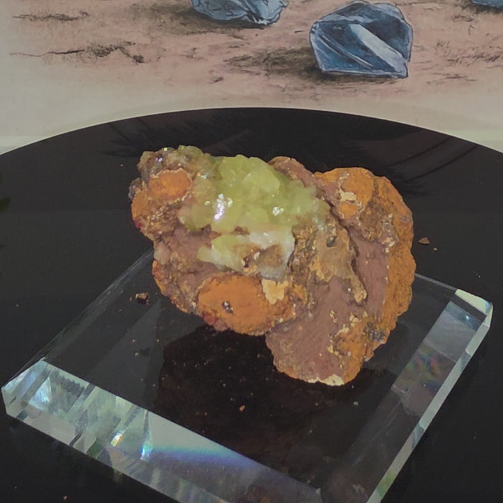 Vibrant Adamite Specimen from Ojuéla Mine exhibiting glowing green crystal formations.