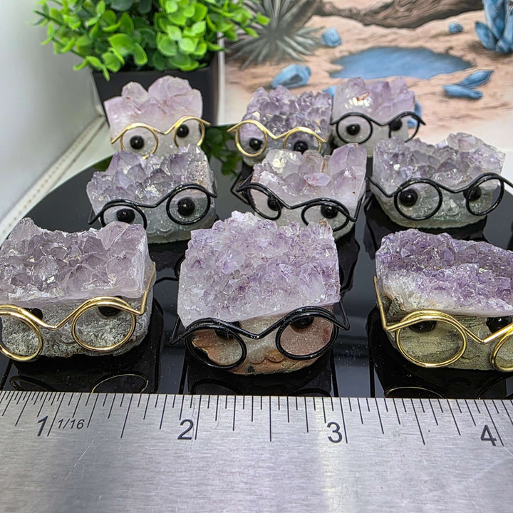 Crystal Buddies - Specimen Carvings featuring adorable crystal hedgehogs with glasses.