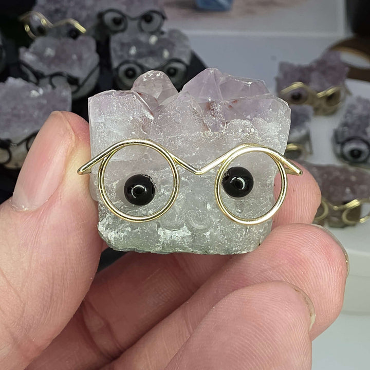 Crystal Buddies - Specimen Carvings featuring a crystal hedgehog with glasses.