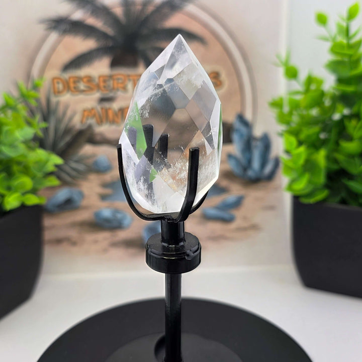 Polished Faceted Clear Quartz Crystal Tear Drop with Stand displayed on a custom metal stand.