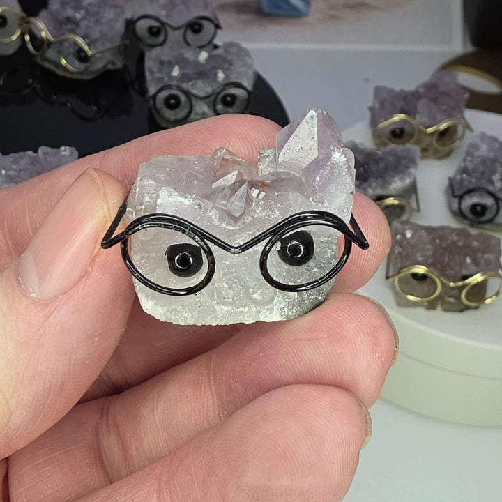 Crystal Buddies - Specimen Carvings featuring a small crystal hedgehog with glasses in hand.