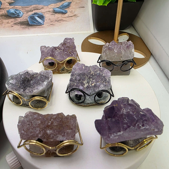 Crystal Buddies - Specimen Carvings featuring cute crystal hedgehogs with glasses.