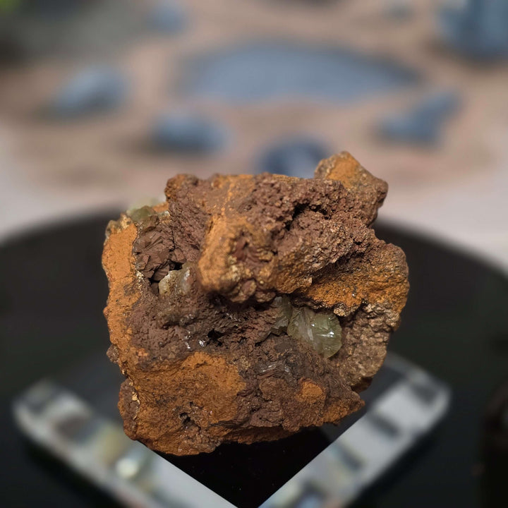 Vibrant Adamite Specimen from Ojuéla Mine exhibiting glowing green crystal formations.