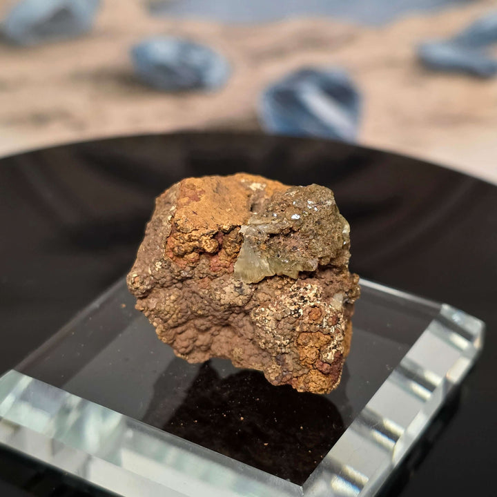 Vibrant Adamite Specimen from Ojuéla Mine exhibiting glowing green crystal formations.