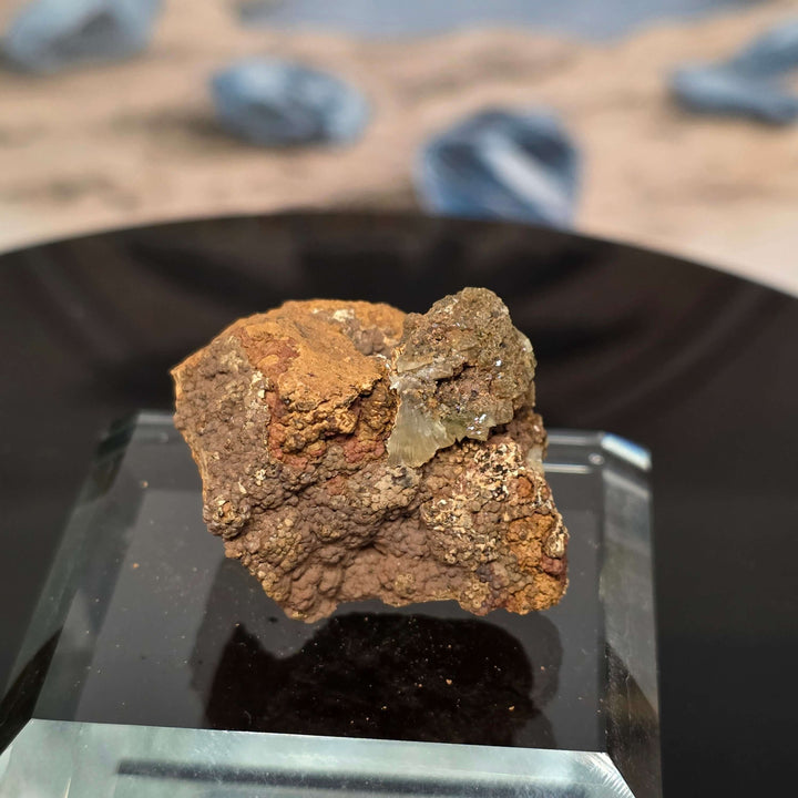 Vibrant Adamite Specimen from Ojuéla Mine exhibiting glowing green crystal formations.