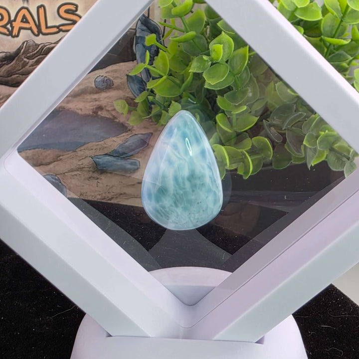 Dive into the tranquil beauty of our Larimar Cabochons. Sourced from the Dominican Republic, these rare and captivating gemstones showcase stunning shades of oceanic blues and whites, reminiscent of Caribbean waters. Each beautifully polished cabochon pai