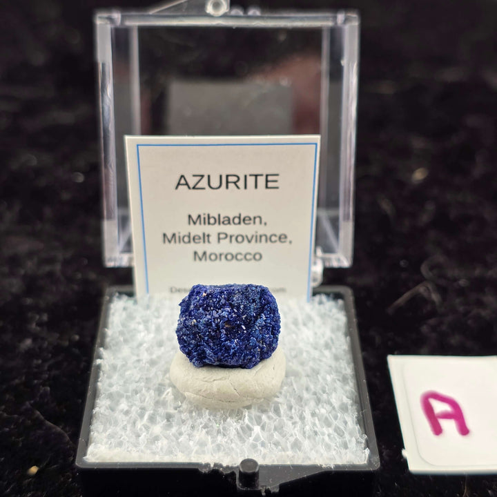 We're thrilled to offer a new selection of Azurite specimens, each mounted within an acrylic "Perky" display box for optimal protection and viewing. These exceptional pieces originate from the renowned Mibladen mining district in Morocco, an area well-kno