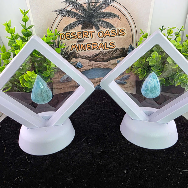 Dive into the tranquil beauty of our Larimar Cabochons. Sourced from the Dominican Republic, these rare and captivating gemstones showcase stunning shades of oceanic blues and whites, reminiscent of Caribbean waters. Each beautifully polished cabochon pai