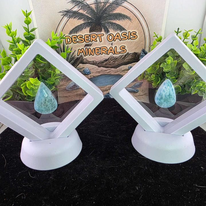 Dive into the tranquil beauty of our Larimar Cabochons. Sourced from the Dominican Republic, these rare and captivating gemstones showcase stunning shades of oceanic blues and whites, reminiscent of Caribbean waters. Each beautifully polished cabochon pai