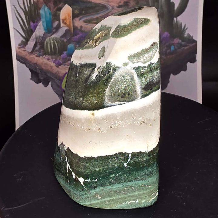 Polished Green Zebra Jasper freeform stone showcasing natural green, gray, and white patterns.