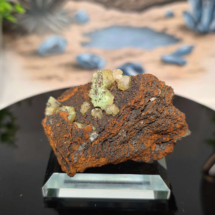 Vibrant Adamite Specimen from Ojuéla Mine exhibiting glowing green crystal formations.