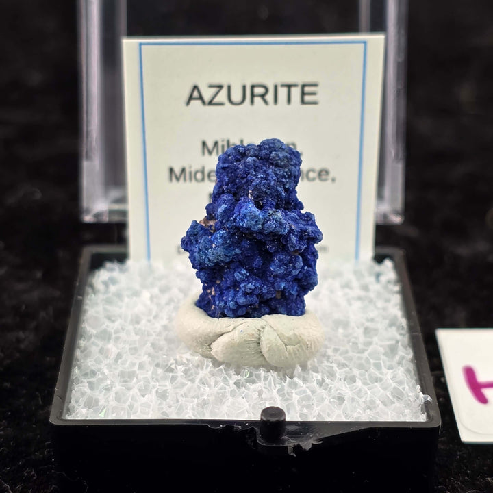 We're thrilled to offer a new selection of Azurite specimens, each mounted within an acrylic "Perky" display box for optimal protection and viewing. These exceptional pieces originate from the renowned Mibladen mining district in Morocco, an area well-kno