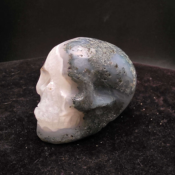 Moss Agate Skull Carving - 2 inch featuring unique blue-green inclusions and milky Quartz for a painterly appearance.