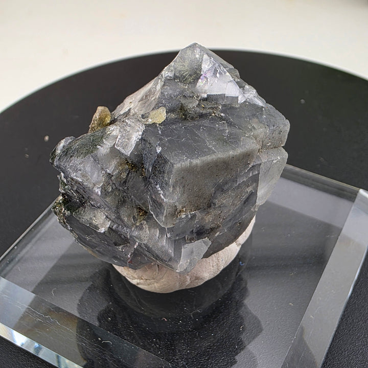 Fluorite Specimen - Yaogangxian Mine China showcasing intergrown crystals with sharp edges and notable color zoning.