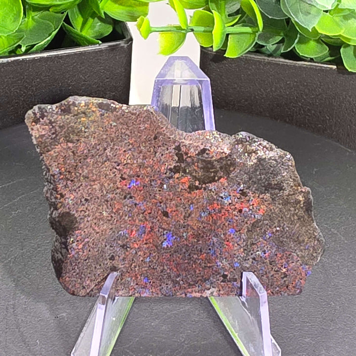 Andamooka Matrix Opal Slab Slice - 125 Carat displayed on a stand with natural colors enhanced by sugar treatment