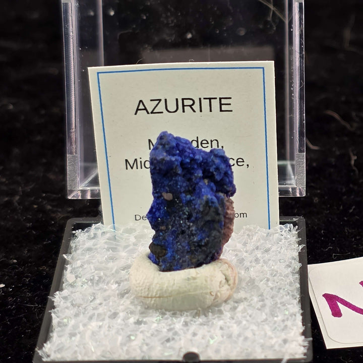 We're thrilled to offer a new selection of Azurite specimens, each mounted within an acrylic "Perky" display box for optimal protection and viewing. These exceptional pieces originate from the renowned Mibladen mining district in Morocco, an area well-kno