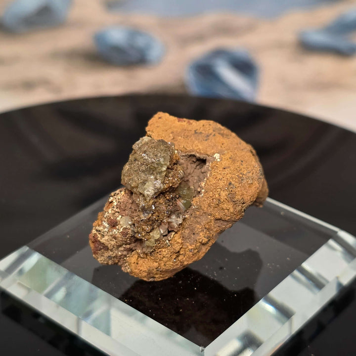 Vibrant Adamite Specimen from Ojuéla Mine exhibiting glowing green crystal formations.