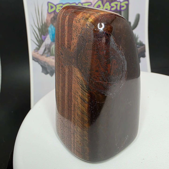 Polished Red Tiger's Eye freeform showing reddish-brown colors and natural oxidation, ideal for decor or crystal healing.