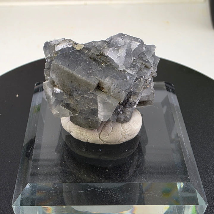 Fluorite Specimen - Yaogangxian Mine China showcasing intergrown crystals with sharp edges and notable color zoning.