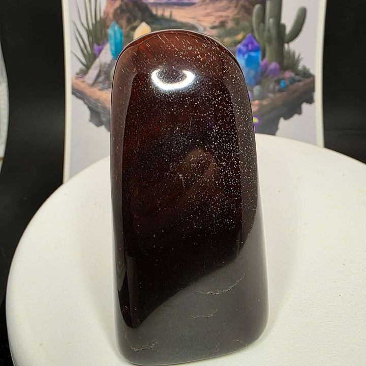 Polished Red Tiger's Eye freeform displaying distinct reddish-brown colors with a glossy finish.