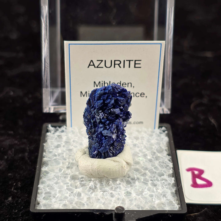We're thrilled to offer a new selection of Azurite specimens, each mounted within an acrylic "Perky" display box for optimal protection and viewing. These exceptional pieces originate from the renowned Mibladen mining district in Morocco, an area well-kno