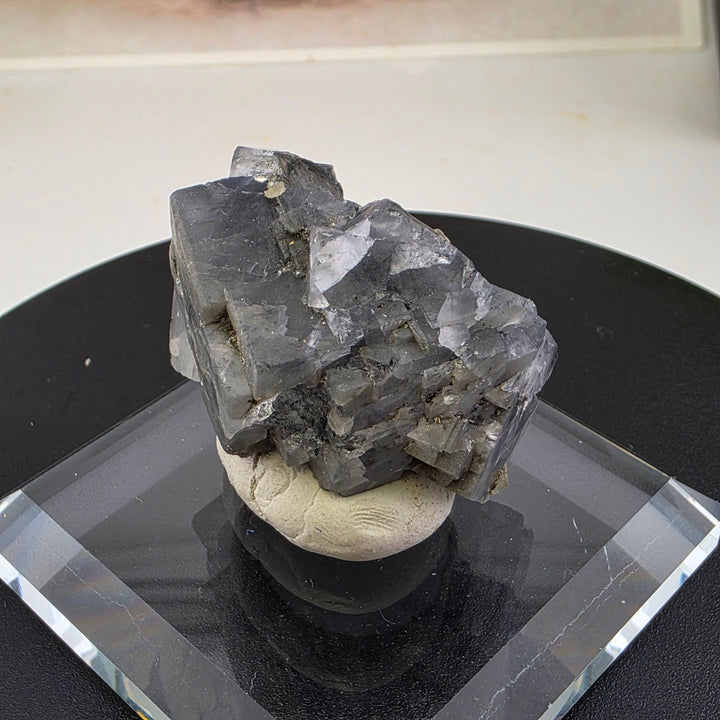 Fluorite Specimen - Yaogangxian Mine China showcasing intergrown crystals with sharp edges and notable color zoning.