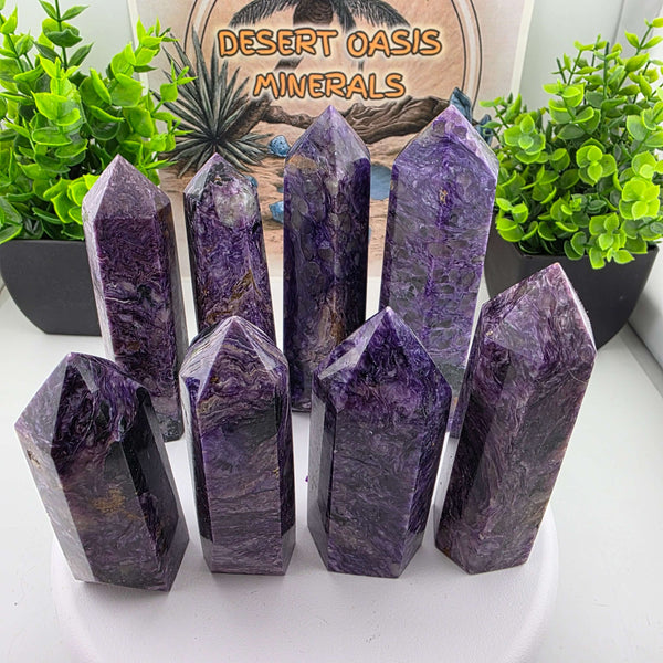 These Charoite towers from Russia boast a polished finish, bringing out the stunning natural patterns of the stone. Its unique properties make it UV reactive, providing a beautiful display under blacklight. A must-have for any crystal enthusiast or collec