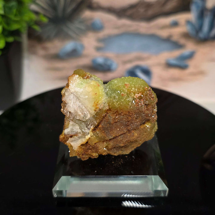 Vibrant Adamite Specimen from Ojuéla Mine exhibiting glowing green crystal formations.