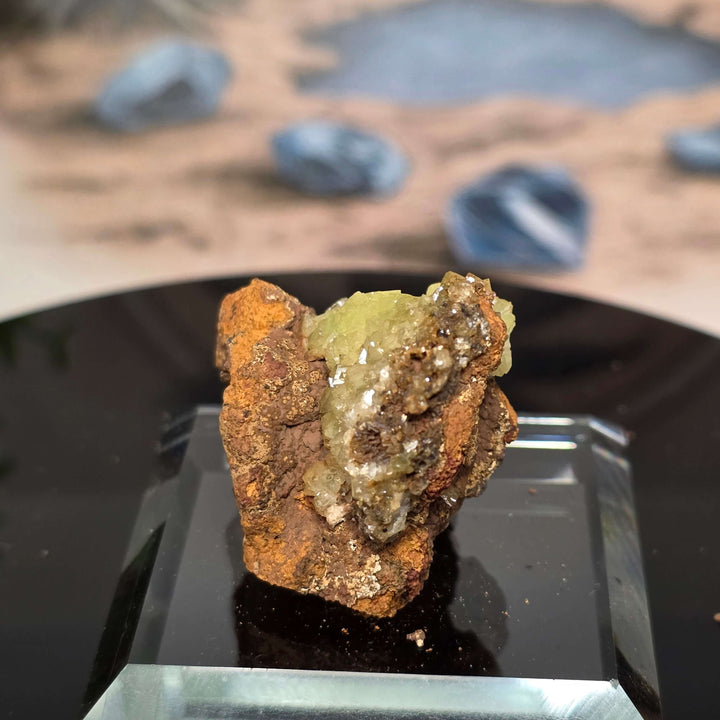 Vibrant Adamite Specimen from Ojuéla Mine exhibiting glowing green crystal formations.