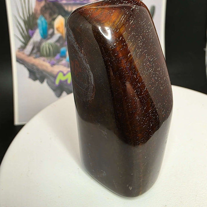 Polished Red Tiger's Eye freeform showcasing rich reddish-brown colors and smooth surface, perfect for decor or collection.