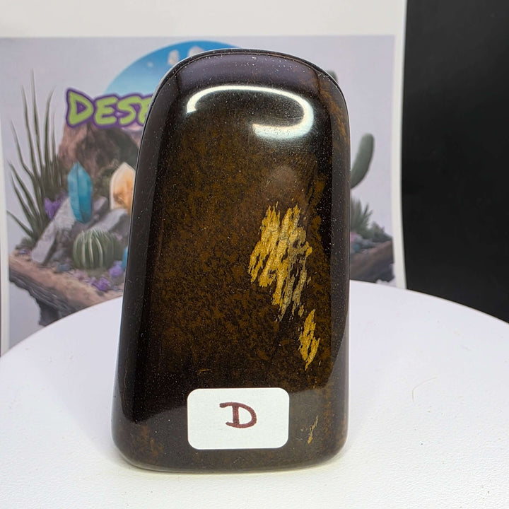 Polished Tiger's Eye freeform with shimmering golden chatoyancy and smooth finish.