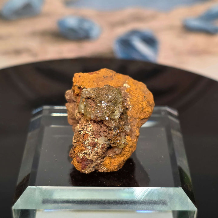 Vibrant Adamite Specimen from Ojuéla Mine exhibiting glowing green crystal formations.