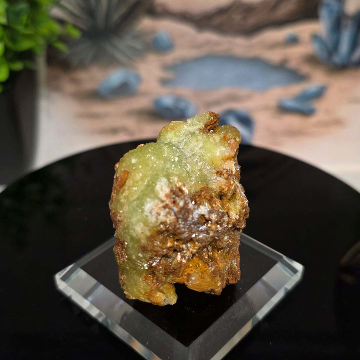 Vibrant Adamite Specimen from Ojuéla Mine exhibiting glowing green crystal formations.