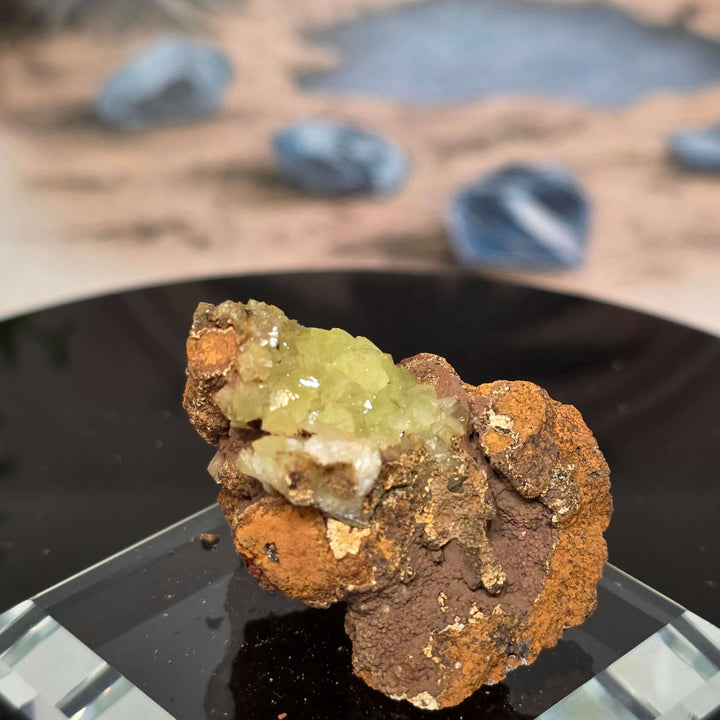 Vibrant Adamite Specimen from Ojuéla Mine exhibiting glowing green crystal formations.