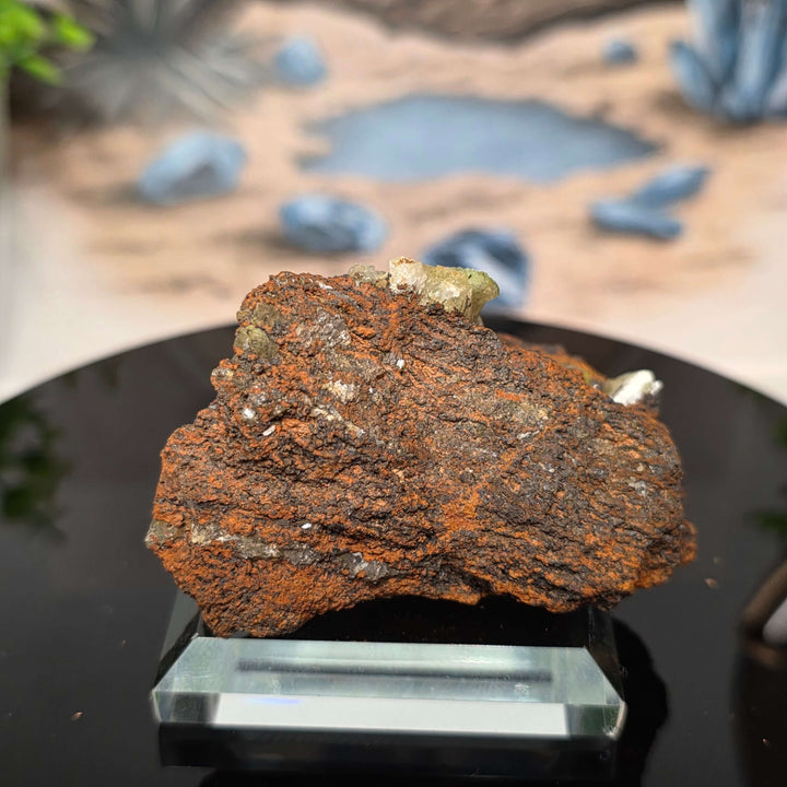 Vibrant Adamite Specimen from Ojuéla Mine exhibiting glowing green crystal formations.