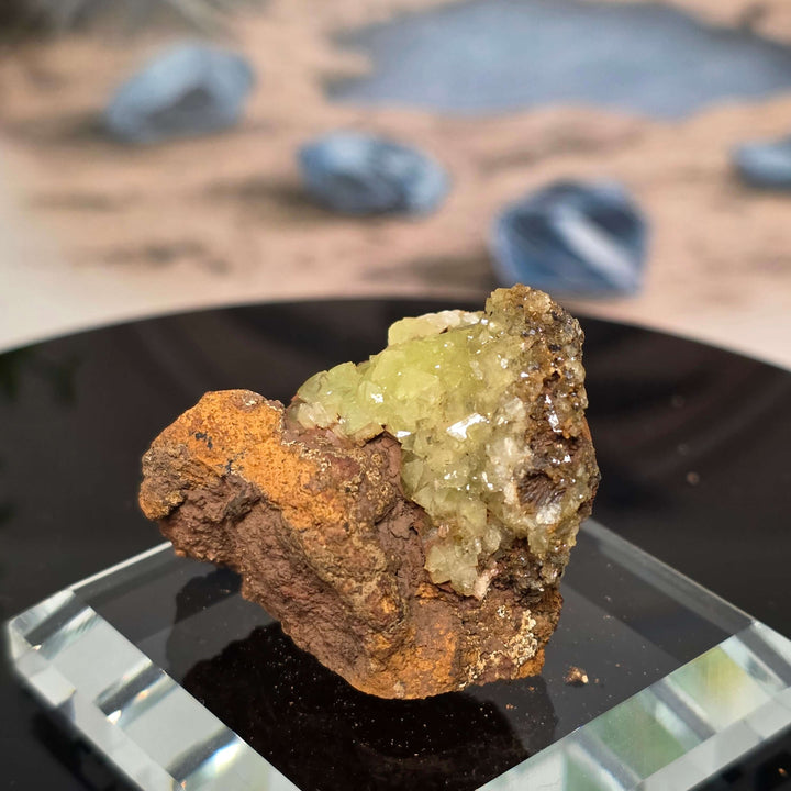 Vibrant Adamite Specimen from Ojuéla Mine exhibiting glowing green crystal formations.