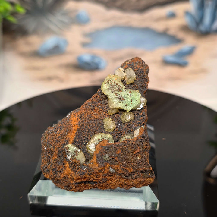 Vibrant Adamite Specimen from Ojuéla Mine exhibiting glowing green crystal formations.