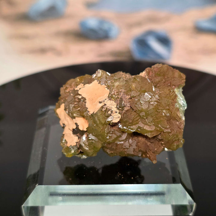 Vibrant Adamite Specimen from Ojuéla Mine exhibiting glowing green crystal formations.