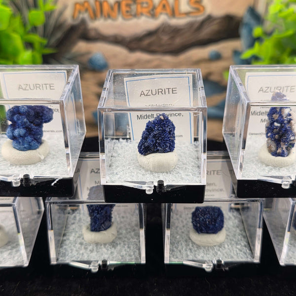 We're thrilled to offer a new selection of Azurite specimens, each mounted within an acrylic "Perky" display box for optimal protection and viewing. These exceptional pieces originate from the renowned Mibladen mining district in Morocco, an area well-kno